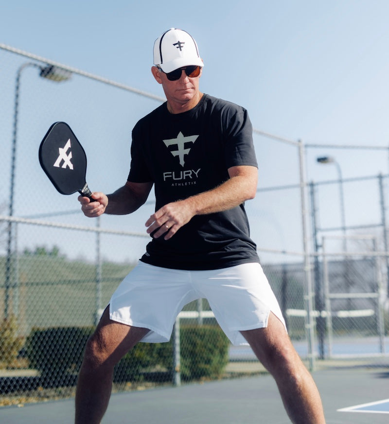Tennis Pro Mark Knowles playing Pickleball in his Erne hat